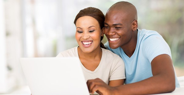 Couple buying tickets online