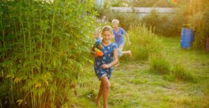 Kids playing outside without worrying about bugs