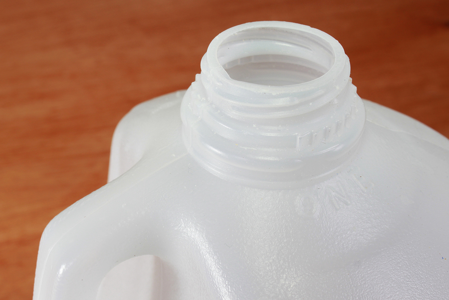Make your own watering can out of a milk jug.