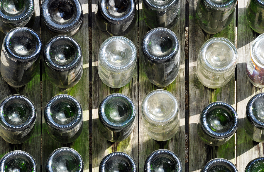 Use wine bottles for container gardening.