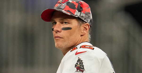 Tom Brady on a football field
