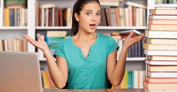 Young girl freaks out while studying for the SAT exam