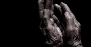 fibromyalgia hands clasp in pain