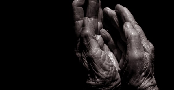 fibromyalgia hands clasp in pain