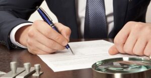 Man filling out an unemployment insurance appeal
