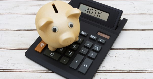 Piggy bank on a calculator that says 401k