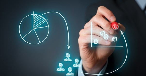Small business owner drawing graphs