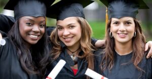 High school graduates show off their diplomas