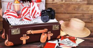 The contents for a capsule wardrobe with a carry-on suit case
