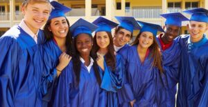 A group of high school graduates pose for a picture