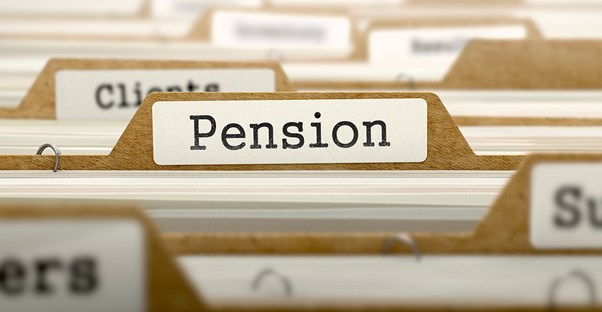 A group of file folders focused on one labeled pension