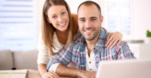 Couple at a table analyzing a 1099 form