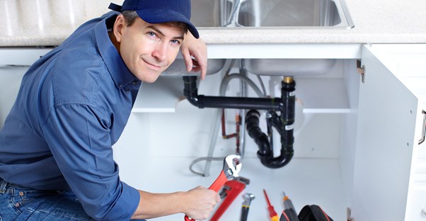 A plumber gets down and dirty