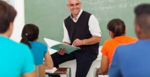 A teacher gives a lecture in his classroom