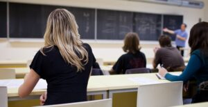 Students listen to a class lecture