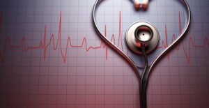 a stethoscope in the shape of a heart symbolizes heart disease awareness