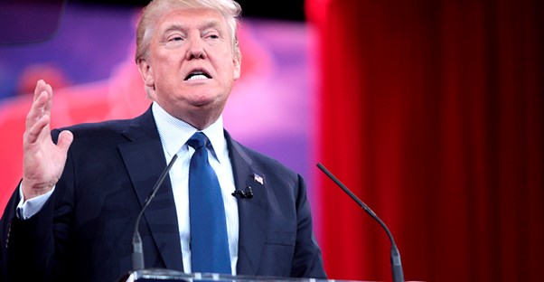Donald trump speaking at a podium