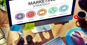 A marketing team works on their computer