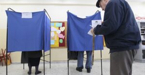 Elderly man voting