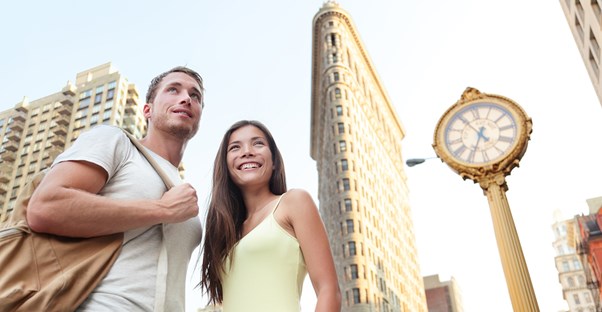 Two foreign exchange students look around a city