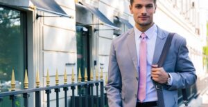A young man dresses up for a job interview