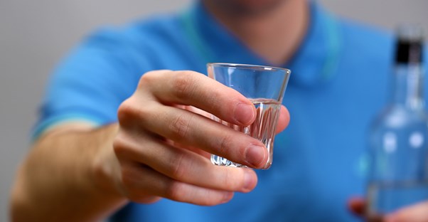 A man struggles with alcohol addiction