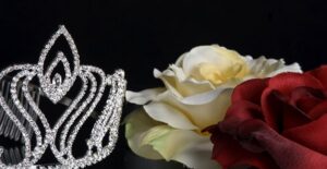 A beauty pageant crown and roses
