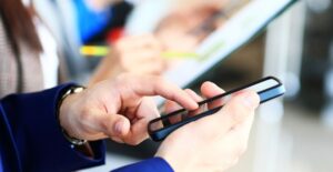 Woman testing out a new smartphone