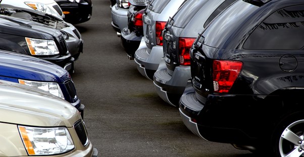 Line of cars at a dealership lot