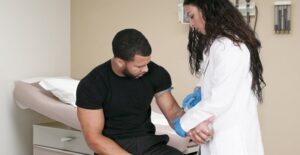 A doctor treats MRSA
