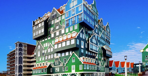 The Inntel Hotel in Amsterdam seems to be made of little houses stacked on top of one another.