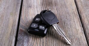 Car keys on a wooden table
