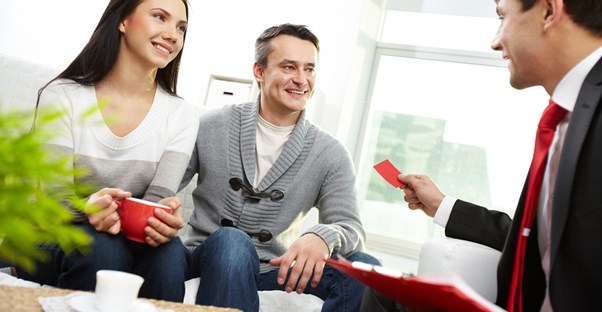 Couple meeting with a new family lawyer