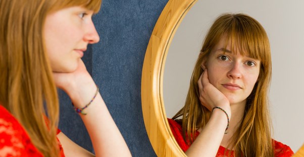 A woman grapples with dry skin