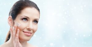 A woman treats her dry skin