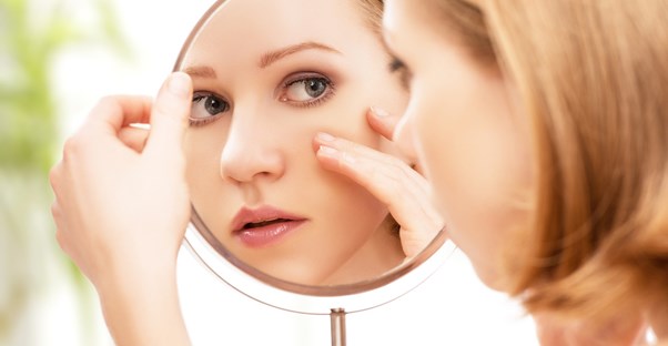 A woman is concerned about her dry skin