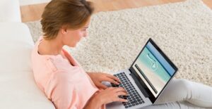 a woman watching live news online