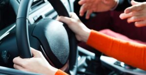 Young woman takes her driving test