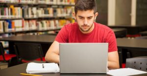 A young student takes a DMV practice test online