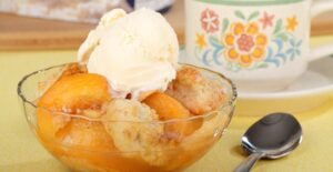 a bowl of peach cobbler