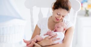 A mother and child in a chair