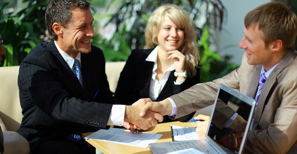 Couple meeting with a bankruptcy attorney for the first time