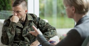 a doctor works with a ptsd patient
