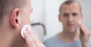 A man treats his ingrown hair
