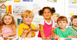 Preschoolers work on an art project