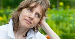 A woman experiences hot flashes