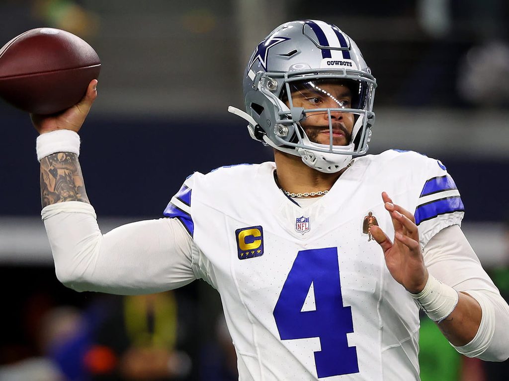 Dak Prescott throws a pass during a game for the Dallas Cowboys.