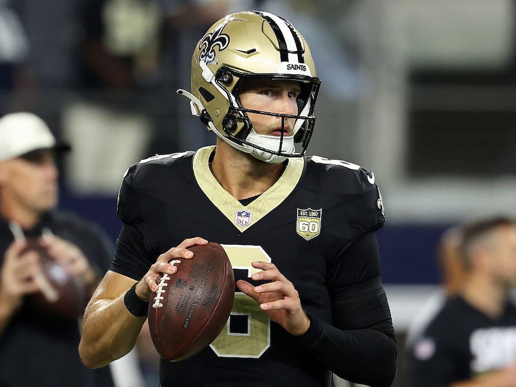 Tyler Shough looks downfield during a Saints preseason game.