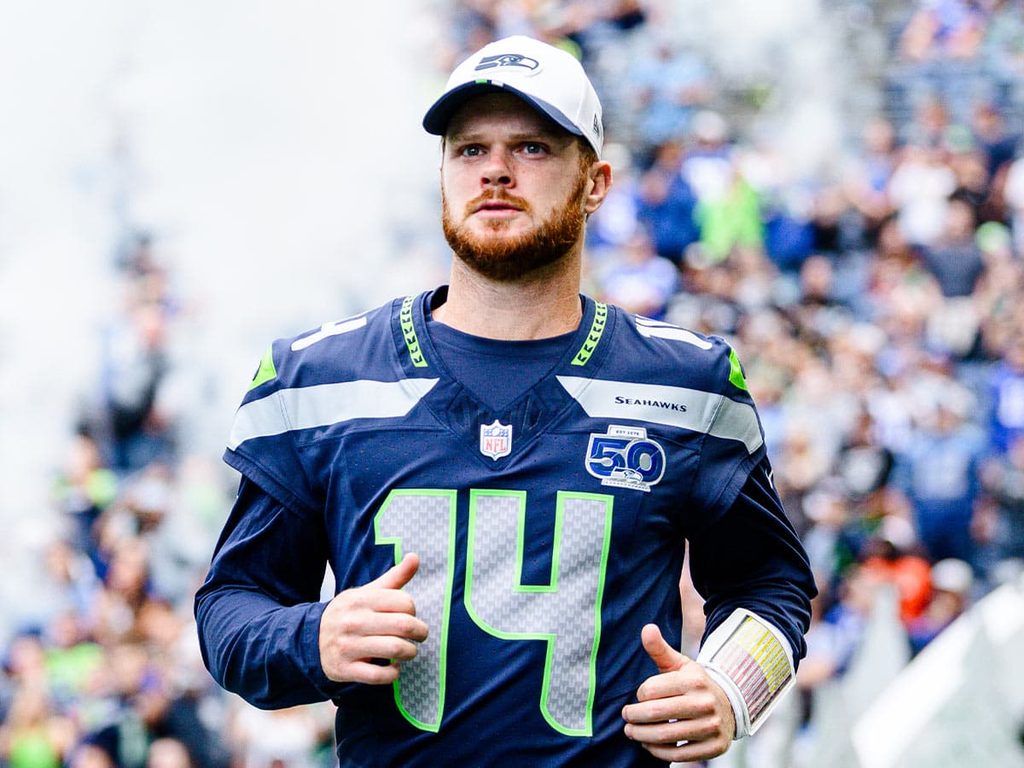 Sam Darnold runs out onto the field prior to a Seahawks game.