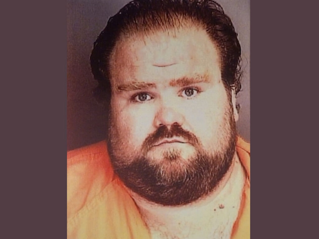 A 1999 mugshot of Alan Eugene Miller in an Alabama jail.